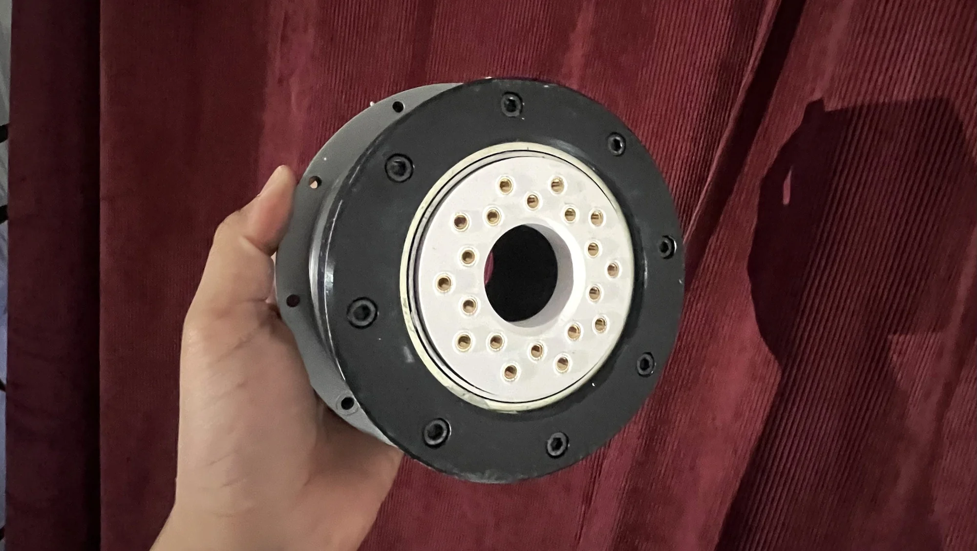 Wave-drive gearbox — held in hand